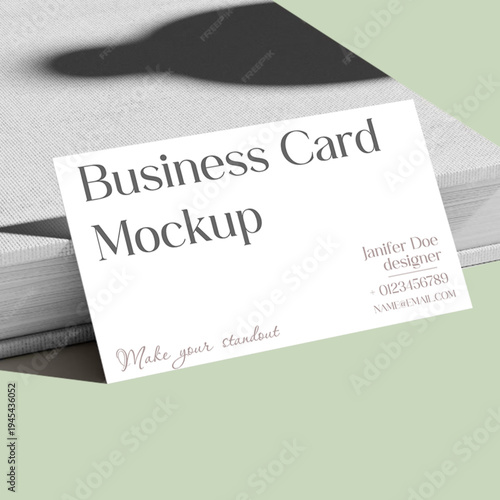 Mockup bussines card on a book