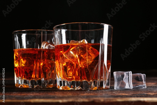 Glasses of whiskey with ice...