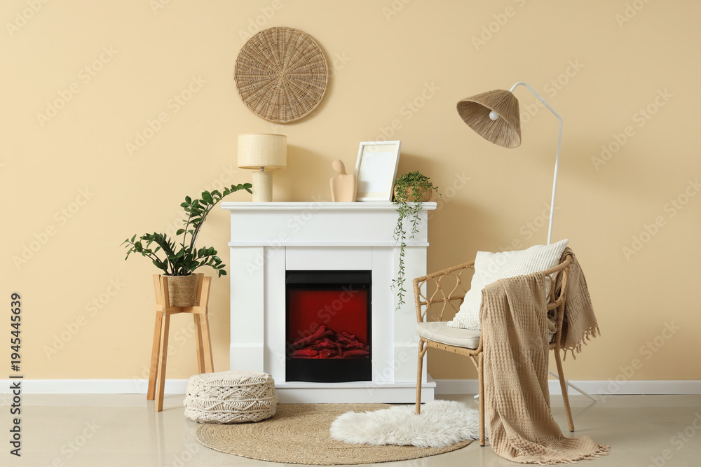 Naklejka premium Fireplace, wicker chair and houseplants in interior of living room
