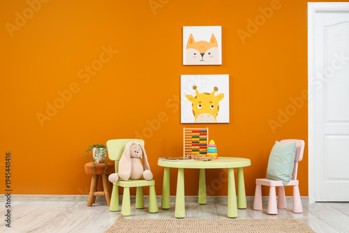 Table with chairs and toys ...