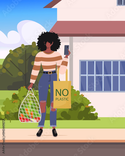 Ecology concept. African American woman standing outdoors in front of a house, holding two reusable shopping bags with produce. Zero waste concept. Eco friendly lifestyle. Vector Not AI generated