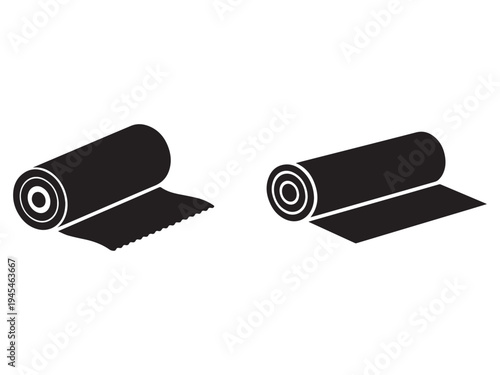 Two black rolled up mats with serrated and straight edges isolated on white background  fitness and sports equipment