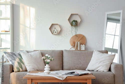 Beige comfortable sofa and ...