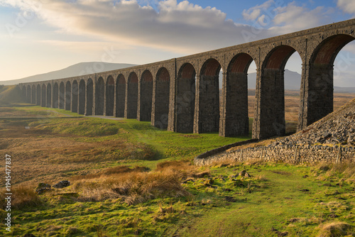 Close-up view of The Ribblehead Viaduct on a sunny morning in The Yorkshire Dales National Park, UK.