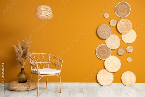Wicker armchair, pouf and v...