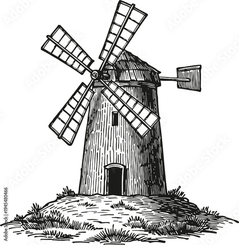 traditional wooden windmill on grassy hill with large blades for grinding grain
