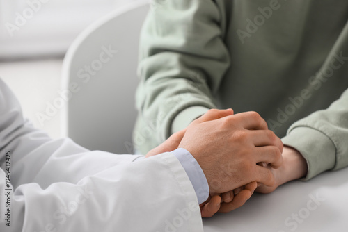 Male doctor and female pati...
