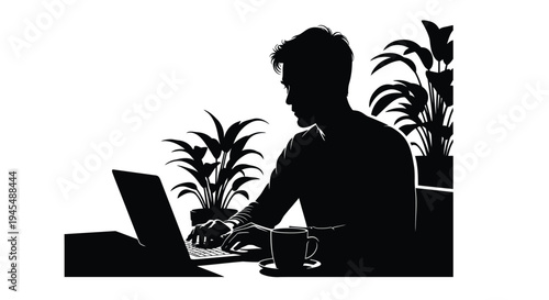 Silhouette of a man working on a laptop with a cup and plants nearby