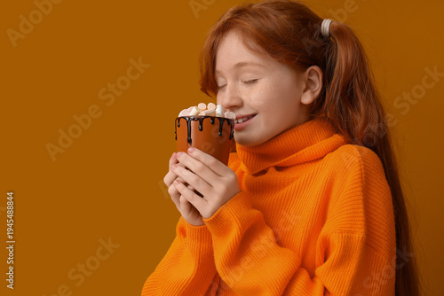 Teenage redhead girl with c...