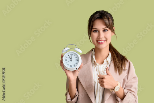 Smiling young businesswoman...