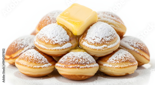 Wallpaper Mural Fluffy mini Dutch pancakes with butter and powdered sugar, isolated on a plain white background Torontodigital.ca
