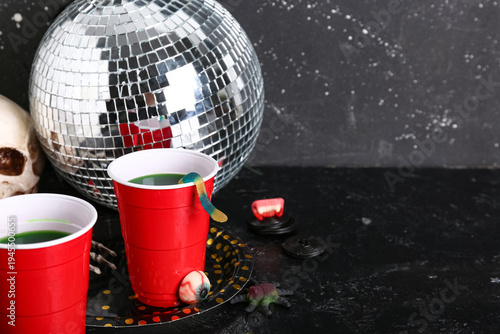 Plastic cups of tasty cockt...