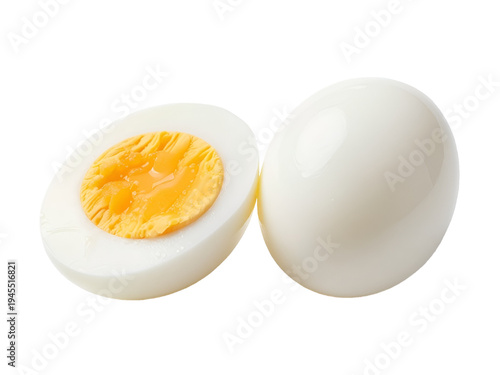 Soft boiled chicken egg and half with yellow runny yolk on transparent background. Hard-boiled egg halves showing bright yellow yolk, high-protein food concept, clipping path included. 