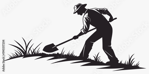 Black silhouette of a man digging with a shovel in a field