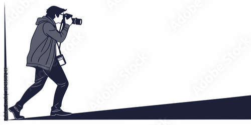 A man in a jacket and cap is taking a photo with a camera