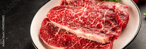 Raw beef steak marbled meat veal tasty snack fresh delicious gourmet food background on the table rustic food top view copy space