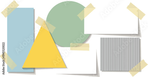 Geometric shapes arranged on a surface with tape holding them in place