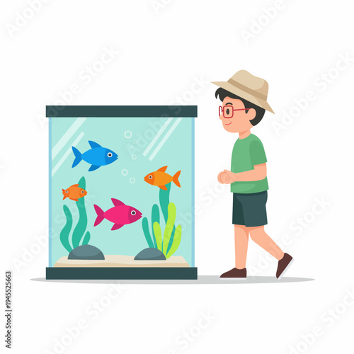 Fish Tank with a Young Boy Looking at Tropical Fish