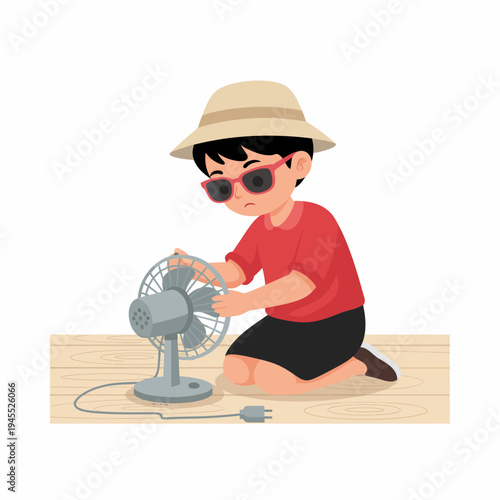 Boy Fixing Grey Electric Fan on Wood Floor Indoors