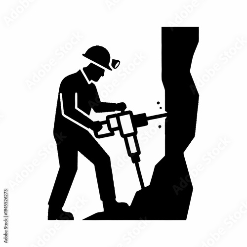 Miner drilling rock with jackhammer in underground mine.