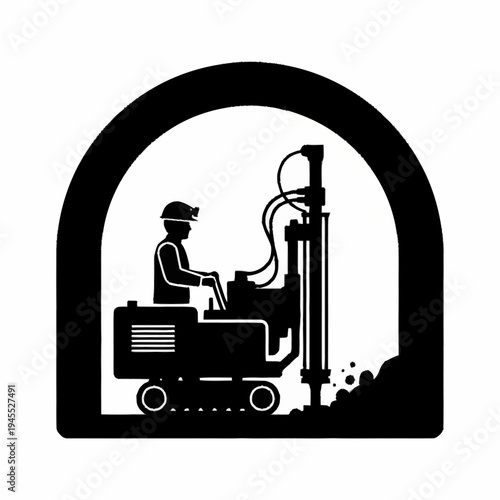 Tunnel drilling machine with operator silhouette.