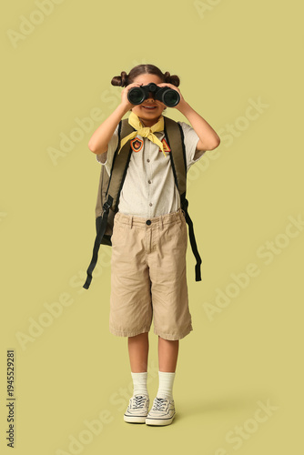 Little girl scout with back...