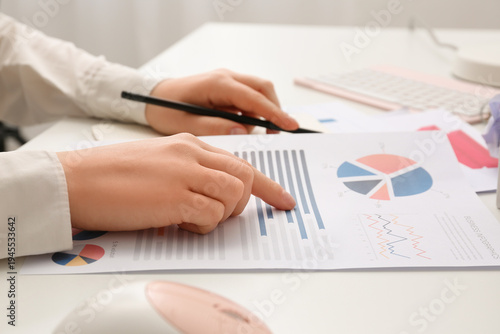 Woman with pen and business...