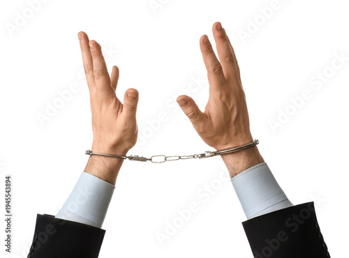 Businessman hands in handcu...