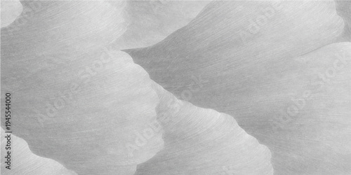 An abstract white crumpled paper texture reveals a cold winter pattern of frost and ice across a stone marble surface under a blue sky