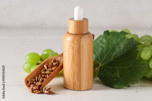Bottle of cosmetic grape se...