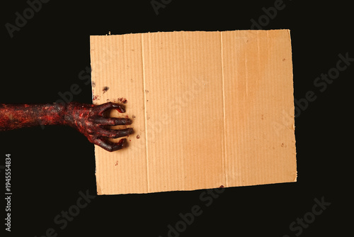 Hand of zombie with blank c...