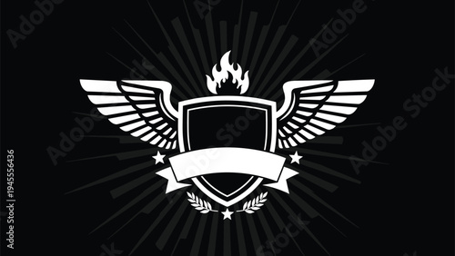 Black and white heraldic graphic featuring a shield with wings a flame at the top stars and a blank ribbon banner over a sunburst effect.