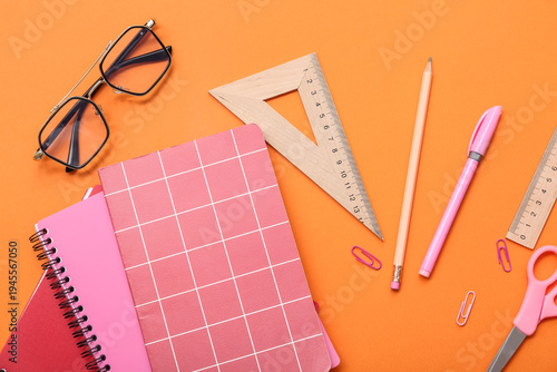 Notebook, eyeglasses and ru...