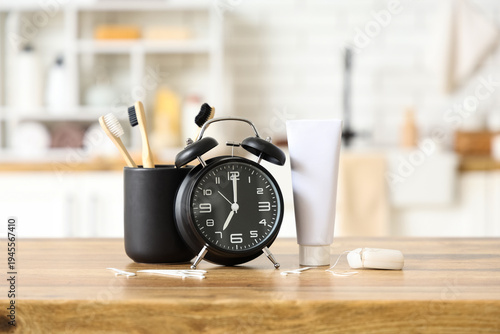 Holder with toothbrushes, t...