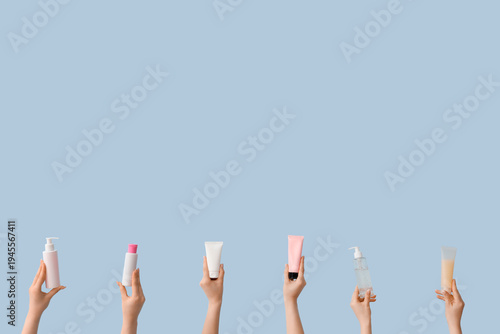 Women with skincare product...