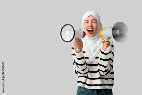 Young Asian Muslim woman sh...