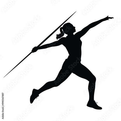 A female athlete in motion throwing a javelin competitively outdoors