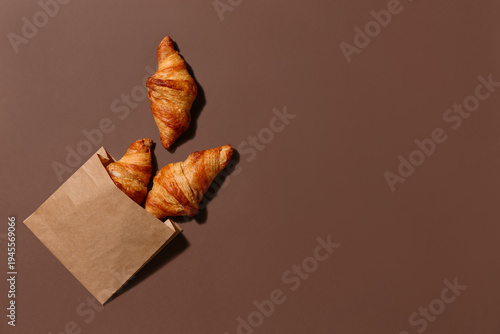 Paper bag with tasty croiss...