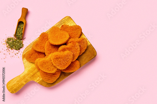 Wooden board of tasty nugge...