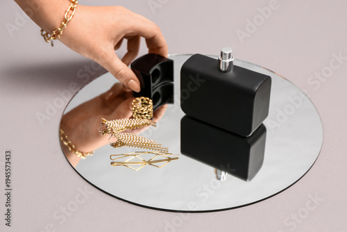 Female hand with bottle of ...