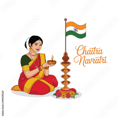 Woman in traditional dress holding oil lamp during chaitra navratri celebration