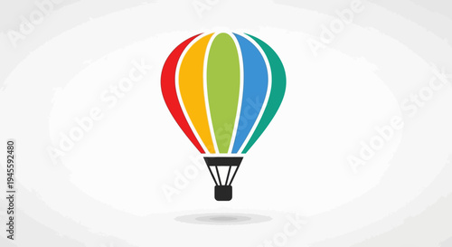 Vibrant hot air balloon floats gently in clear sky with colorful stripes.