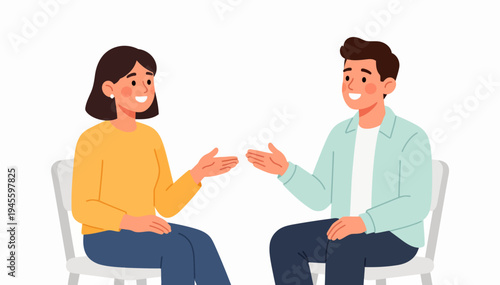 Two people sit facing each other, smiling warmly. They gesture with hands, showing friendly engagement. Their posture suggests open, comfortable conversation. Ideal for scenes of counseling