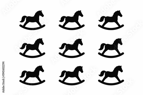Pattern of nine rocking horse silhouettes in black on white background