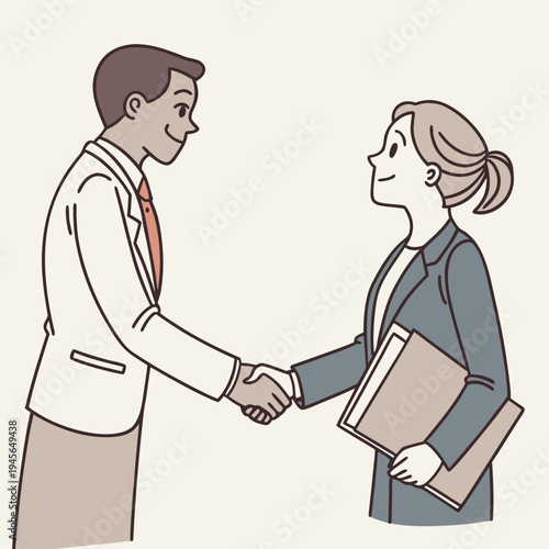 A man and woman shaking hands in a business setting