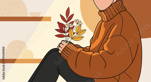 Cozy Autumn Scene: Person in Sweater Holding Fall Leaves and Flowers