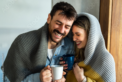 Happy multiethnic couple, love and hug laughing in joyful happiness for bonding time together