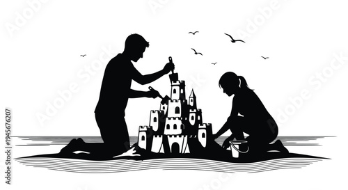 Father and daughter building a sandcastle together on the beach silhouette