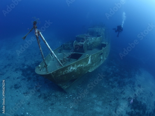  shipwreck scenery underwater ship wreck deep blue water ocean scenery of metal underwater scuba divers to explore