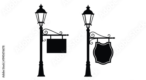 Two ornate lampposts with blank signs a dark silhouette